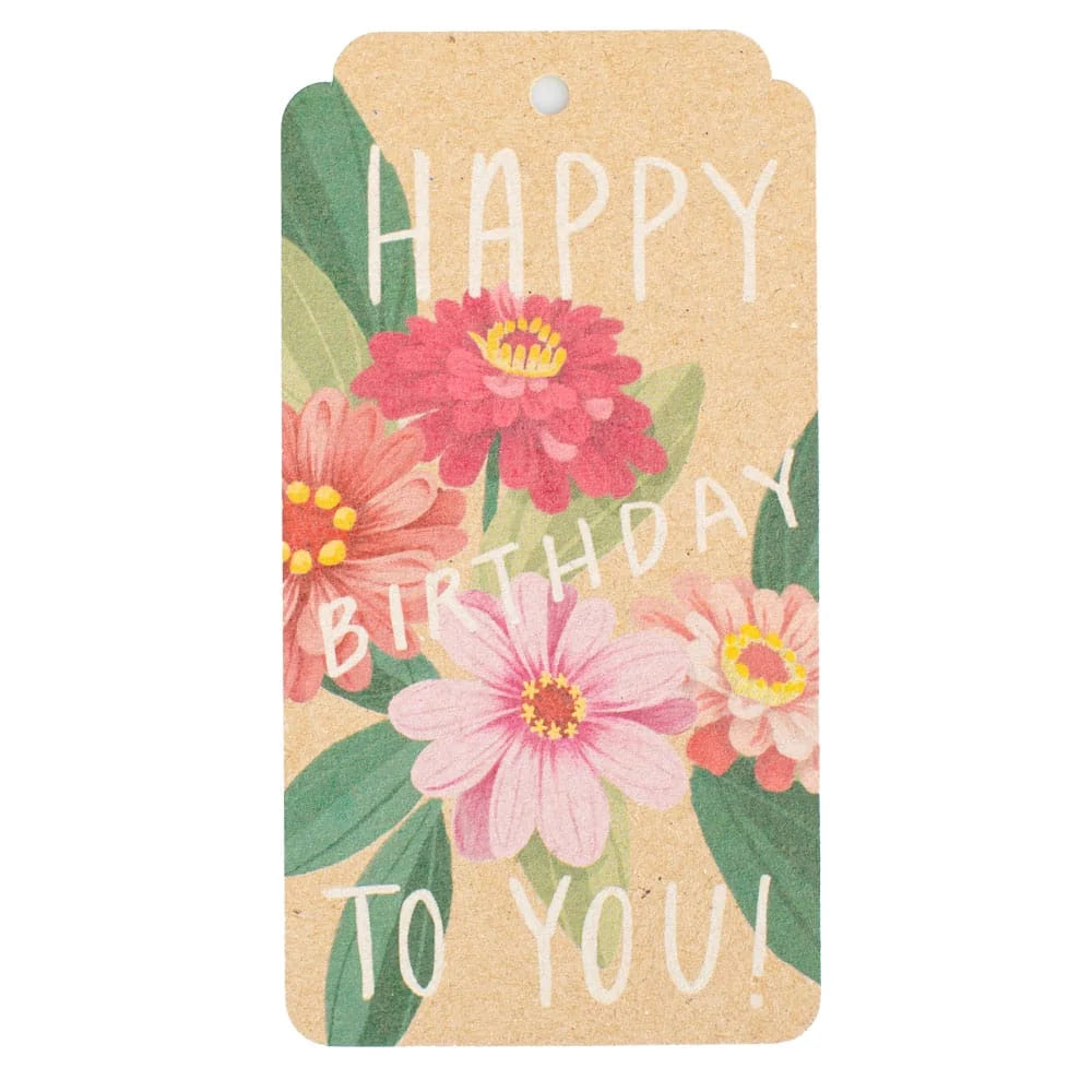 A rectangular kraft paper gift tag with rounded corners, featuring a colorful floral design of pink and red flowers with green leaves and the text 'HAPPY BIRTHDAY TO YOU!' in white lettering.