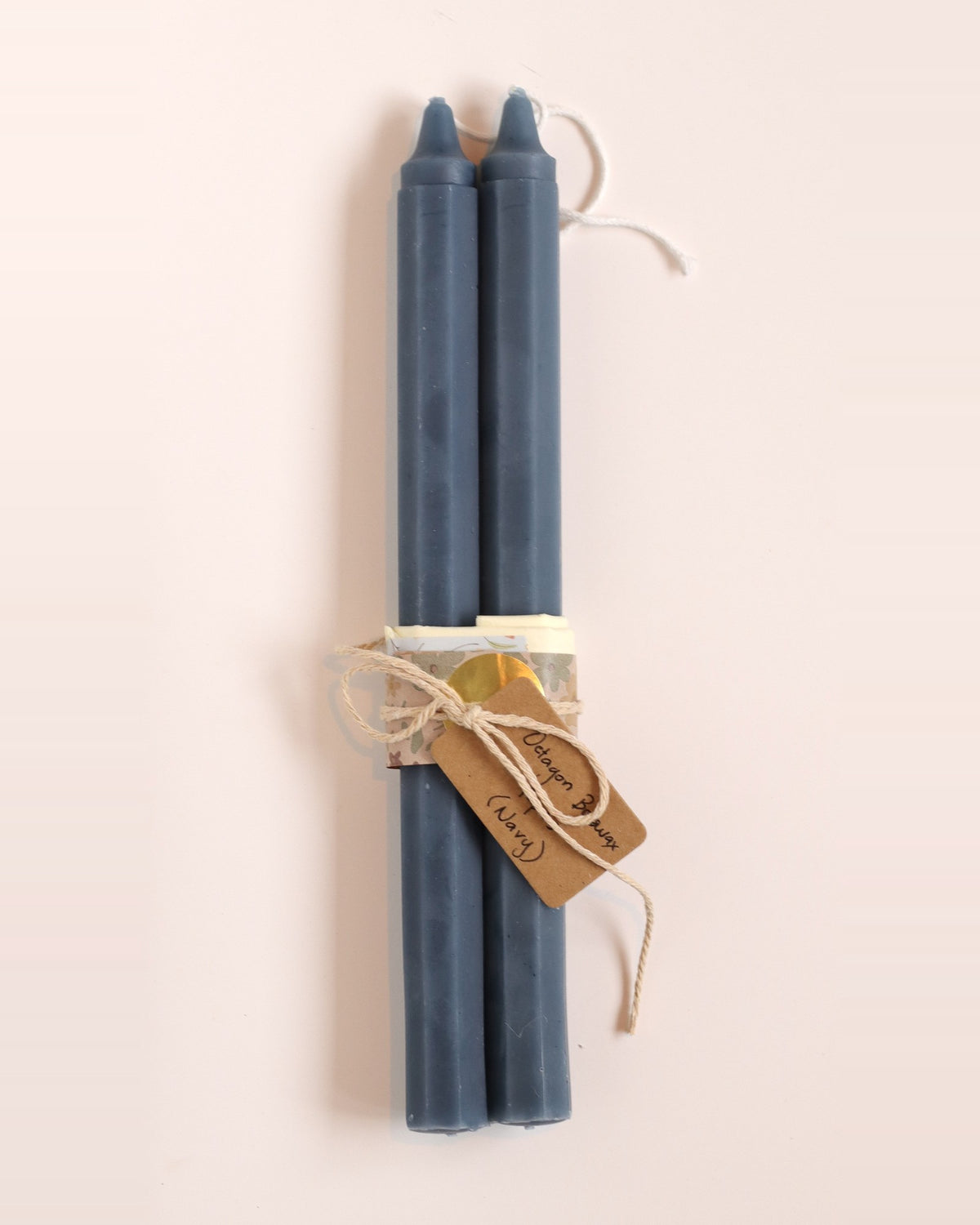 Elliot's Treasures Octagon Taper Beeswax Candle Pair in Navy, tied with twine and a kraft tag